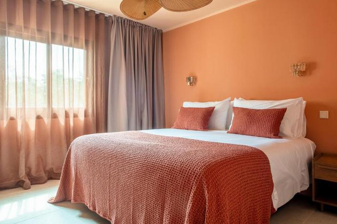 Imagen de la habitación del Hotel Boutique MalaQuita. Foto 13