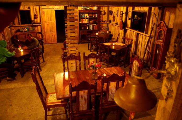 Imagen del bar/restaurante del Hotel Boutique Marduk Gardens. Foto 2