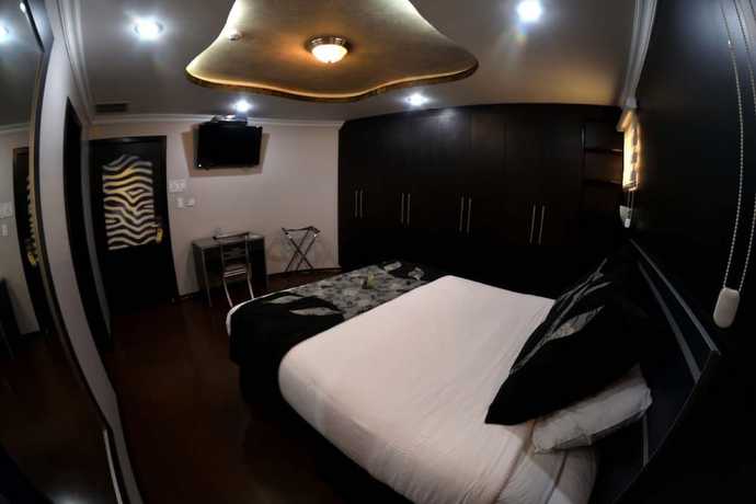 Imagen de la habitación del Hotel Boutique Mary Carmen, Ambato. Foto 17