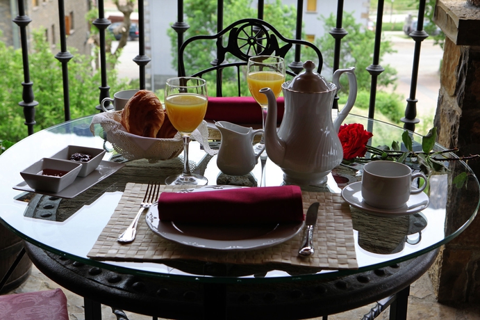 Imagen del bar/restaurante del Hotel Boutique Mediodía and Apartments. Foto 8