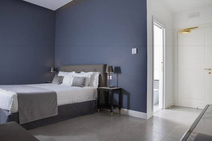 Imagen de la habitación del Hotel Boutique Metro 900. Foto 7