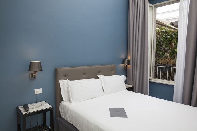 Imagen de la habitación del Hotel Boutique Metro 900. Foto 10