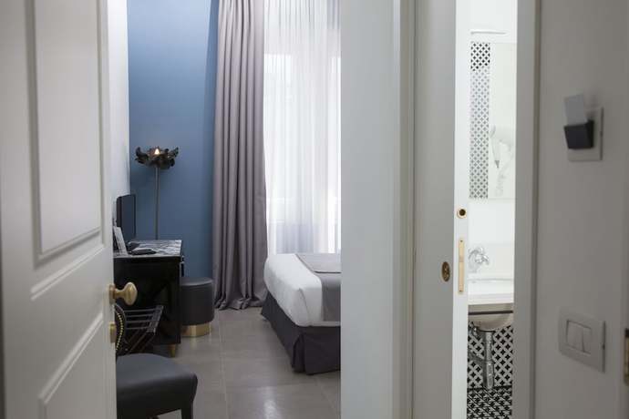 Imagen de la habitación del Hotel Boutique Metro 900. Foto 14