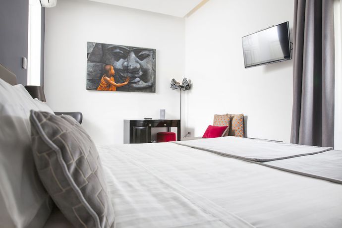 Imagen de la habitación del Hotel Boutique Metro 900. Foto 16