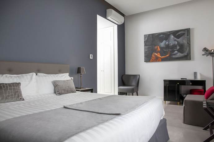 Imagen de la habitación del Hotel Boutique Metro 900. Foto 17