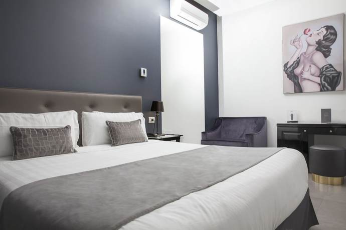 Imagen de la habitación del Hotel Boutique Metro 900. Foto 19