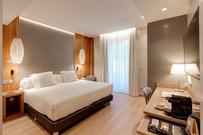 Imagen de la habitación del Hotel Boutique Mirlo Barcelona. Foto 10