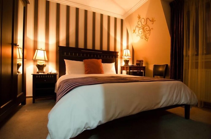 Imagen de la habitación del Hotel Boutique Monaco. Foto 3