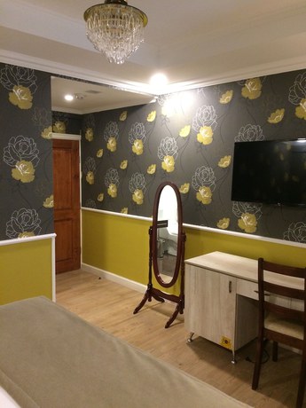 Imagen de la habitación del Hotel Boutique Normandi. Foto 3