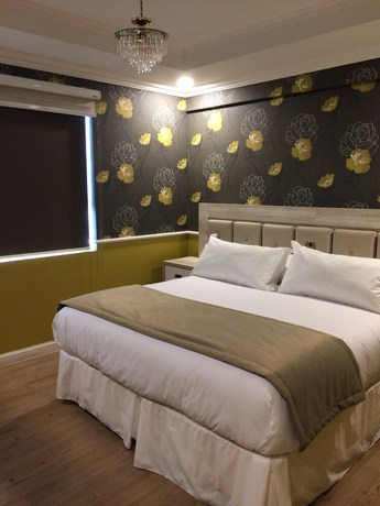 Imagen de la habitación del Hotel Boutique Normandi. Foto 8