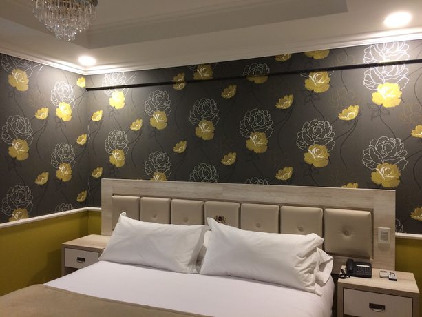 Imagen de la habitación del Hotel Boutique Normandi. Foto 10