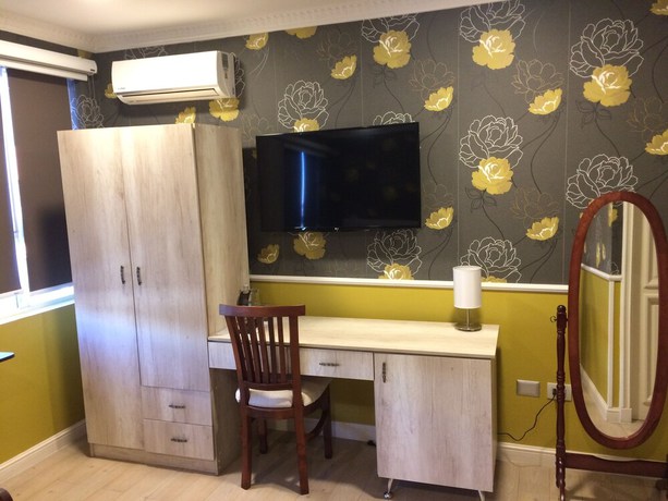 Imagen de la habitación del Hotel Boutique Normandi. Foto 12