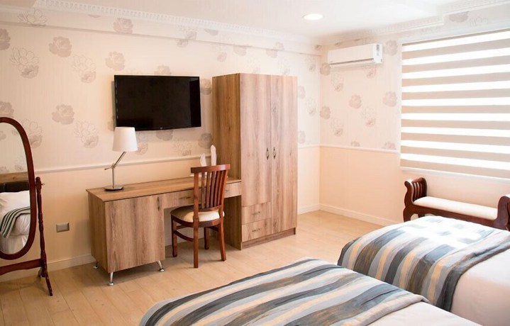 Imagen de la habitación del Hotel Boutique Normandi. Foto 16