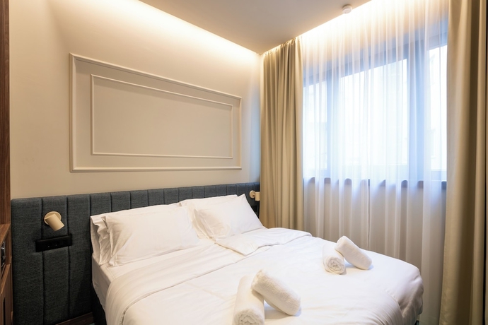 Imagen de la habitación del Hotel Boutique OPERA. Foto 15