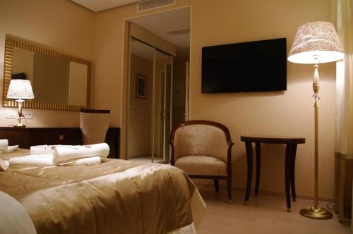 Imagen de la habitación del Hotel Boutique Oasi. Foto 8