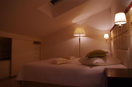 Imagen de la habitación del Hotel Boutique Oasi. Foto 10