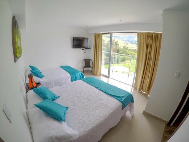 Imagen de la habitación del Hotel Boutique Palmas De Salento. Foto 11