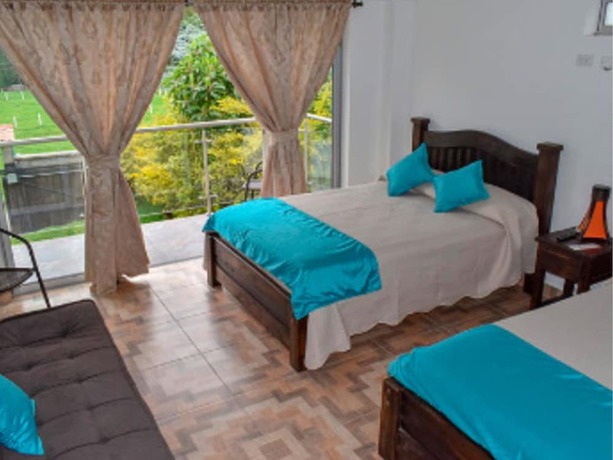 Imagen de la habitación del Hotel Boutique Palmas De Salento. Foto 16