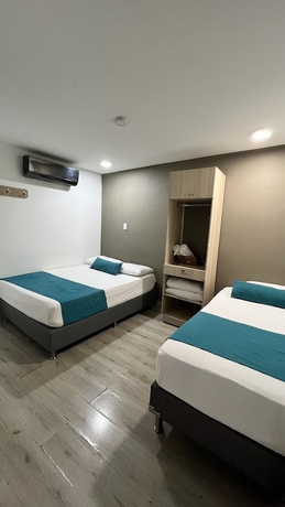 Imagen de la habitación del Hotel Boutique Plaza 36. Foto 3