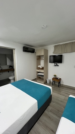 Imagen de la habitación del Hotel Boutique Plaza 36. Foto 6