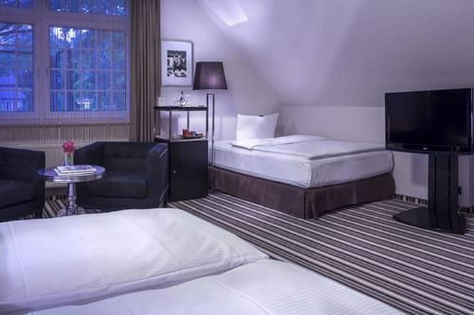 Imagen de la habitación del Hotel Boutique Poppenbütteler Hof. Foto 2