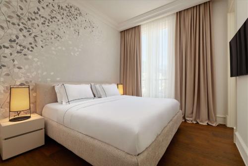 Imagen de la habitación del Hotel Boutique Porto Palace. Foto 18
