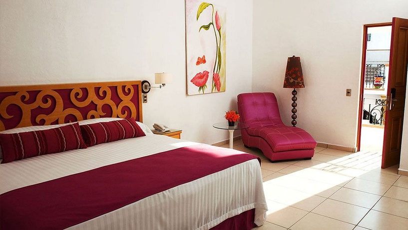 Imagen de la habitación del Hotel Boutique Pueblo Lindo. Foto 4