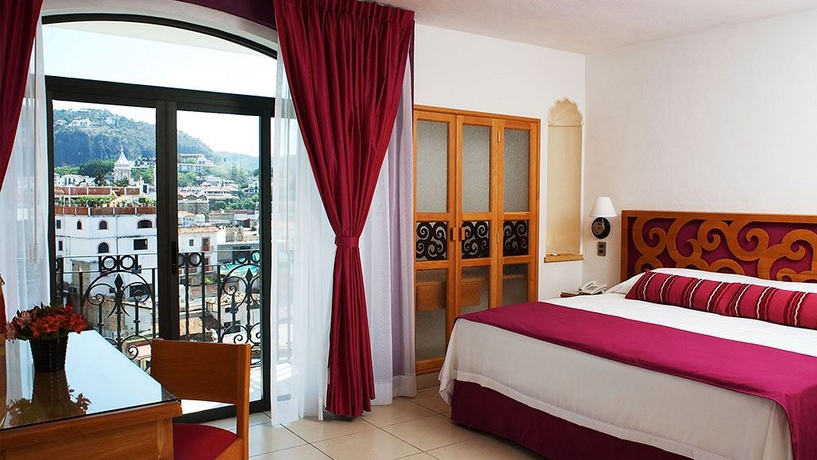 Imagen de la habitación del Hotel Boutique Pueblo Lindo. Foto 5