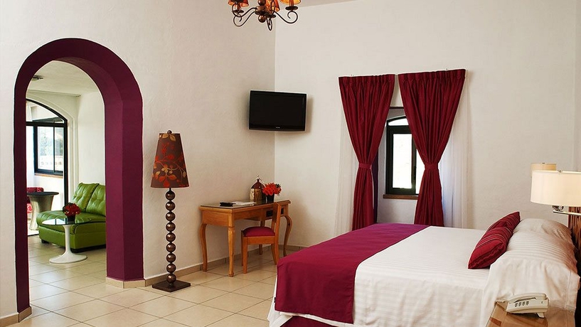 Imagen de la habitación del Hotel Boutique Pueblo Lindo. Foto 6