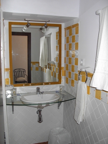 Imagen de la habitación del Hotel Boutique Puerta del Rincón. Foto 10
