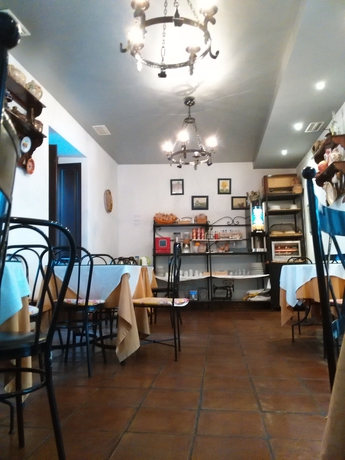 Imagen del bar/restaurante del Hotel Boutique Puerta del Rincón. Foto 2