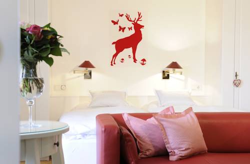 Imagen de la habitación del Hotel Boutique Relais Chalet Wilhelmy. Foto 5