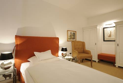 Imagen de la habitación del Hotel Boutique Relais Chalet Wilhelmy. Foto 9