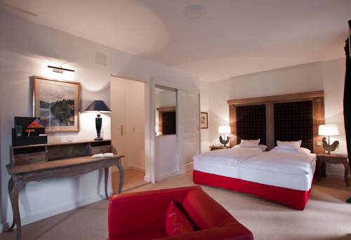 Imagen de la habitación del Hotel Boutique Relais Chalet Wilhelmy. Foto 10