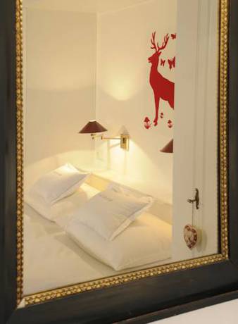 Imagen de la habitación del Hotel Boutique Relais Chalet Wilhelmy. Foto 11