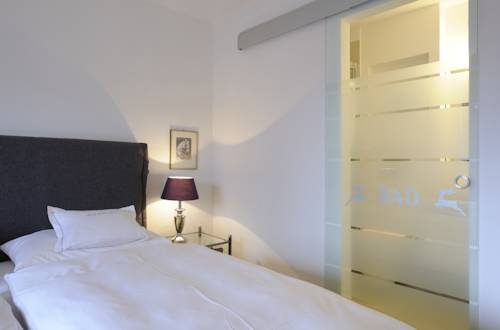 Imagen de la habitación del Hotel Boutique Relais Chalet Wilhelmy. Foto 12