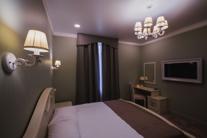 Imagen de la habitación del Hotel Boutique Renaissance. Foto 16