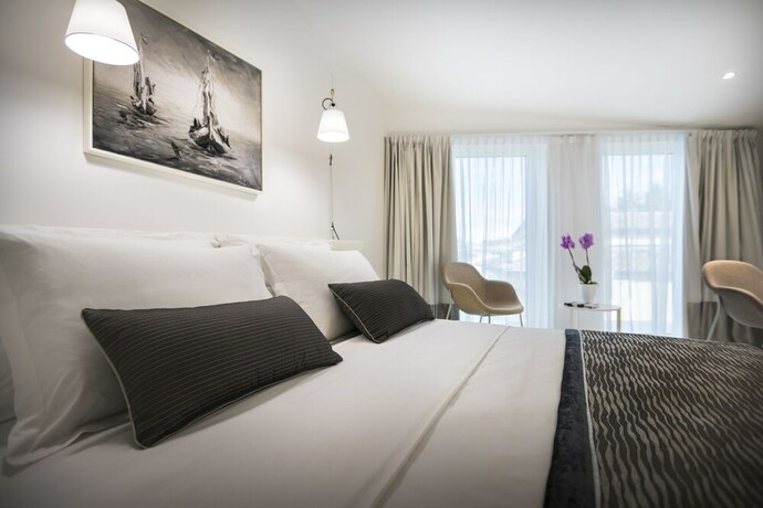 Imagen de la habitación del Hotel Boutique Rivalmare. Foto 11