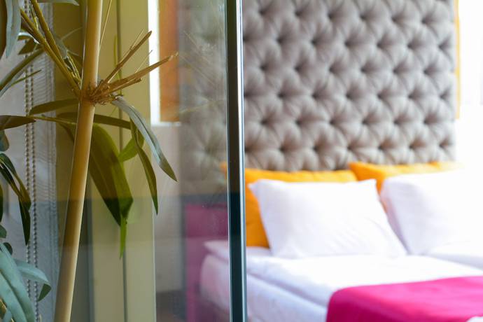 Imagen de la habitación del Hotel Boutique Rooms. Foto 10