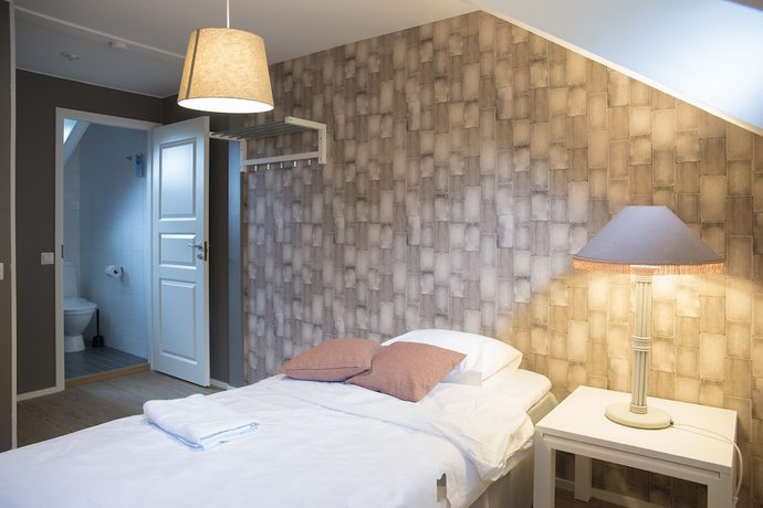 Imagen de la habitación del Hotel Boutique Sawohouse. Foto 13