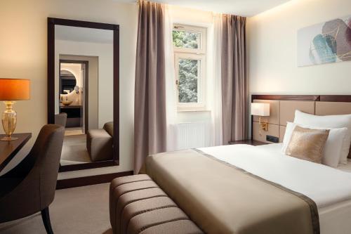 Imagen de la habitación del Hotel Boutique Saxonia. Foto 16