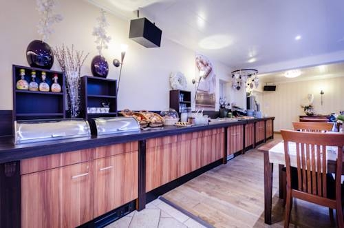 Imagen del bar/restaurante del Hotel Boutique Scheepers. Foto 3