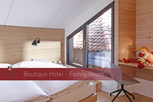 Imagen de la habitación del Hotel Boutique Schlossberg. Foto 4
