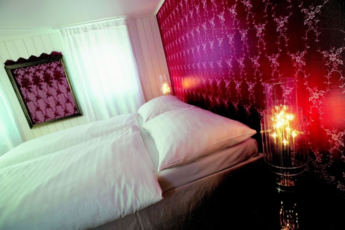 Imagen de la habitación del Hotel Boutique Schluessel. Foto 12