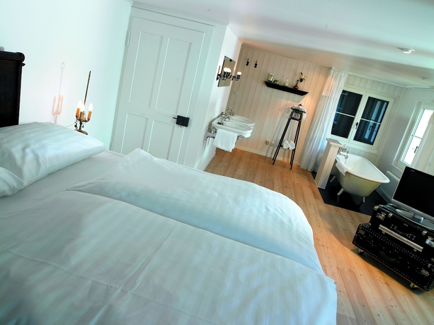 Imagen de la habitación del Hotel Boutique Schluessel. Foto 13