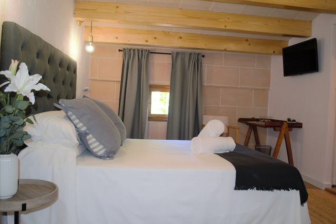 Imagen de la habitación del Hotel Boutique Ses 5 Claus. Foto 5