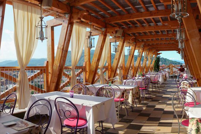 Imagen del bar/restaurante del Hotel Boutique Simfonia. Foto 2