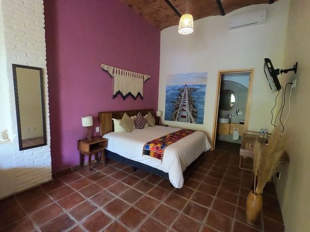 Imagen de la habitación del Hotel Boutique Sol y Luna Spa. Foto 7