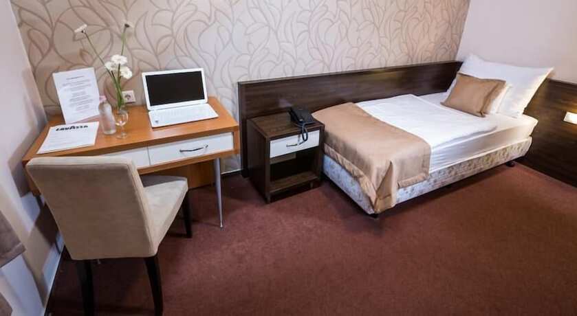 Imagen de la habitación del Hotel Boutique Sopianae. Foto 6