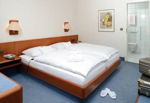 Imagen de la habitación del Hotel Boutique Stadtmitte. Foto 6